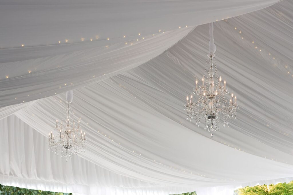 Experience a luxurious ambiance in Atlanta with T3 Event Rentals. Our elegant draped fabric ceilings, complete with stunning crystal chandeliers and tiny interwoven string lights, are perfect for creating a sophisticated atmosphere. Everything you need to transform your event is available for rent through T3 Event Rentals.