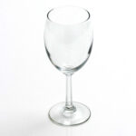 The Optic White Wine Glass from the 25-rack collection is elegantly displayed with its slender stem and round base on a simple white background, as if freshly lifted—perfect for your next event in Atlanta. Available for rent at T3 Event Rentals.
