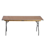 Discover T3 Event Rentals Rectangle Folding Tables, ideal for your event in Dawsonville. These rental tables boast a wooden top with sturdy metal legs, showcased against a simple white background. Perfect for gatherings across North Georgia!.