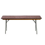 The Rectangle Folding Table, available for rent from T3 Event Rentals, showcases its elegant wooden top and sturdy metal legs in Dawsonvilles premier event scenes.