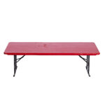 Against a plain white background, a sleek red Rectangle Folding Table with a smooth surface and sturdy black metal legs is ready for your event in Dawsonville. T3 Event Rentals provides high-quality table rentals for all occasions in the Dawsonville area.