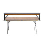 Discover the elegance of T3 Event Rentals Rectangle Folding Tables, now available for your next event in Atlanta. These tables feature a striking two-tier design with a lighter wood bottom and darker top, perfectly complemented by sturdy metal legs that stand out against any plain white backdrop. Ideal for creating memorable occasions, our rental services bring sophistication to every gathering in Atlanta.