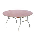 This adaptable Round Table, offered by T3 Event Rentals, features a wooden folding top and sturdy metal angled legs. Each tabletop bears unique scuffs and marks from use, contributing to its charm. Ideal for those who appreciate practicality and character, this rental piece is captured against a white background. Available in Atlanta through T3 Event Rentals for your next event.