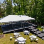 Event photos of our staging leveling out a back yard to house a tent.