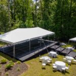Event photos of our staging leveling out a back yard to house a tent.