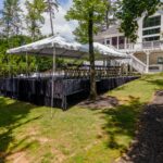 Event photos of our staging leveling out a back yard to house a tent.