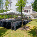 Event photos of our staging leveling out a back yard to house a tent.