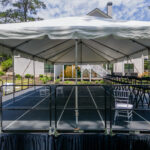 Event photos of our staging leveling out a back yard to house a tent.