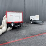 Event photo of our 25 ton ac unit in use cooling a frame tent powered by our generator.