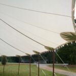 Close up of the rope connection points on a sailcloth tent
