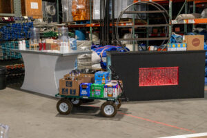 A cart full of beer beside our Delano Table and Bubble Bar