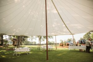 An underside shot of a Sailcloth Tent at a Graduation party