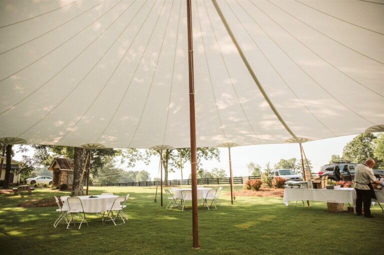 An underside shot of a Sailcloth Tent at a Graduation party