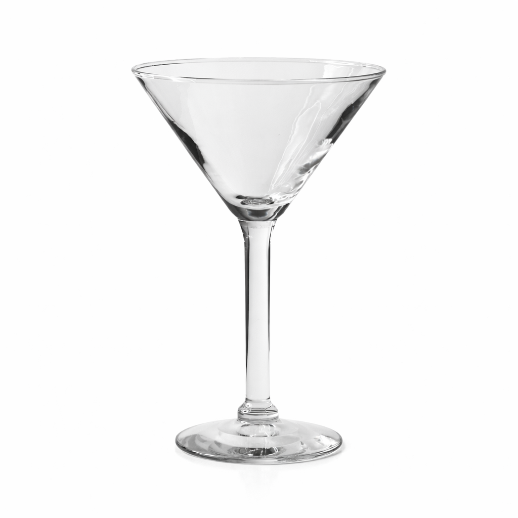 A pristine martini glass, featuring a wide brim and an elegant long stem, is artfully showcased against a simple white backdrop. Perfect for your event in Atlanta, this luxury glassware rental is offered by T3 Event Rentals.