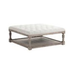Perfect for lounge seating at Atlanta events, our square ottoman rental from T3 Event Rentals features a stylish tufted, light-colored cushioned top, sturdy wooden frame with four legs, and a convenient lower open shelf. Add comfort and elegance to your Atlanta celebration with T3 Event Rentals’ premium event furniture rentals.