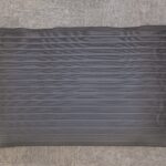 T3 Event Rentals black Anti-Fatigue Mat with textured lines on gray carpet is available for rent in Forsyth County.