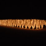 T3 Event Rentals’ twinkle lights glow on a draped structure in Dahlonega, creating magical nights with our rental decor.
