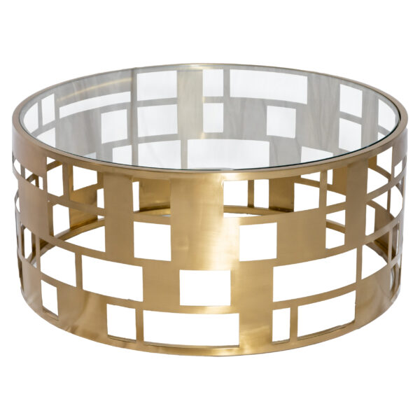 Make a statement at your next event with the Buckhead Coffee Table rental from T3 Event Rentals. This modern glam piece features an open geometric drum base in brushed gold paired with a clear tempered glass top. It’s the perfect combination of elegance and functionality, designed to complement a variety of event décor styles. Why Choose the Buckhead Coffee Table Rental: Brushed-gold drum base with a bold geometric cut-out pattern Clear tempered glass top for safety and style Versatile design works for modern, glam, and contemporary event themes Large surface space for décor, drinks, and event styling Complements our sofas, lounge chairs, and accent seating collections Perfect For: Wedding lounge seating areas VIP hospitality spaces at corporate events Charity galas and award ceremonies Brand activations and photo-worthy lounges Specifications Dimensions: Approx. 36″ diameter × 17″ height Top Material: Tempered clear glass Base Material: Metal with brushed-gold finish Style: Modern Glam Geometric Drum Indoor Use: Yes Outdoor Use: Covered areas only Category: Lounge Furniture / Coffee Tables Product Identifiers Name: Buckhead Coffee Table Rental Color: Brushed Gold & Clear Material: Metal & Tempered Glass Dimensions: 36″ × 17″ (approx.) Style: Modern Glam Geometric Drum Category: Lounge Furniture / Coffee Tables Use Cases Anchor a wedding lounge area with modern elegance Pair with plush seating for a cohesive VIP lounge setup Style with floral arrangements or candles for eye-catching décor Use as a centerpiece for corporate hospitality lounges