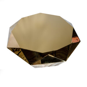Gold diamond-shaped coffee table with faceted geometric design
