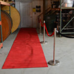 Chrome stanchion post detail with rope attachment ring and circular base