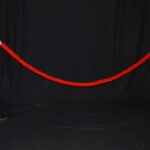 Chrome stanchion post detail with rope attachment ring and circular base